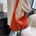 Plush Fashion Hub Millie embroidered shoulder bag with intricate floral embroidery and a stylish shoulder strap.