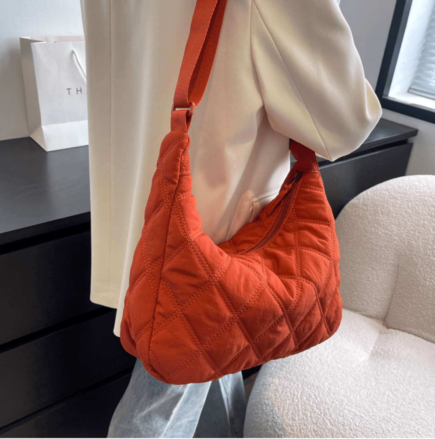 Plush Fashion Hub Millie embroidered shoulder bag with intricate floral embroidery and a stylish shoulder strap.