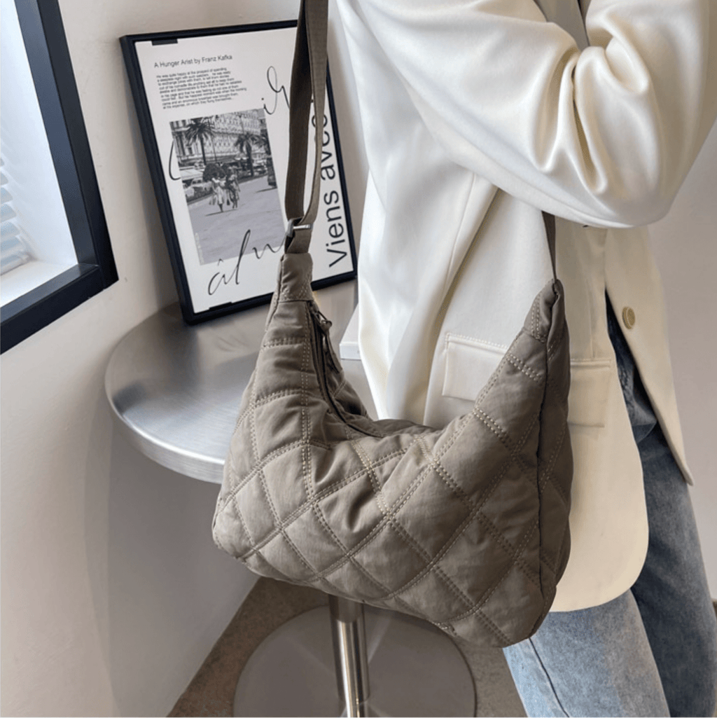 Embroidered Millie shoulder bag from Plush Fashion Hub featuring intricate embroidery and a stylish bag design.