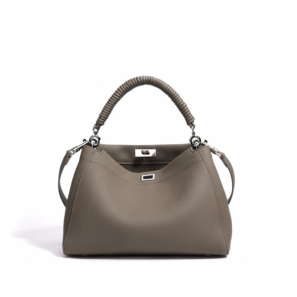 Motorcycle-style fashion large-capacity LadyShow.Store crossbody bag with multiple compartments and sleek design.