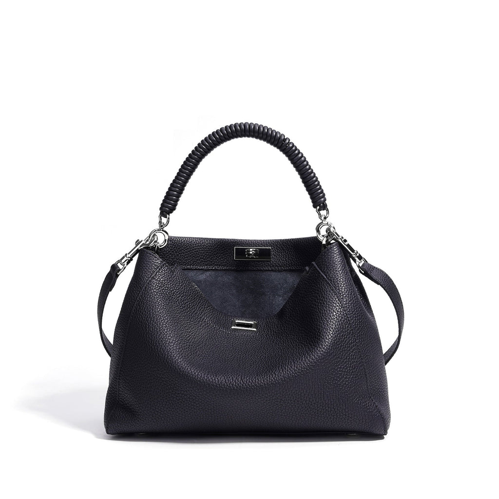 Motorcycle-style fashion large-capacity crossbody bag with multiple compartments and adjustable strap for women.