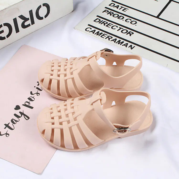 Girls casual flat sandals with open toe design, featuring hollow details, by Trendy Attic Store01, suitable for boys and girls.