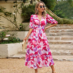 Women’s summer floral V-neck dress by Dukun Design with a flowy fabric and vibrant floral pattern, perfect for warm weather.