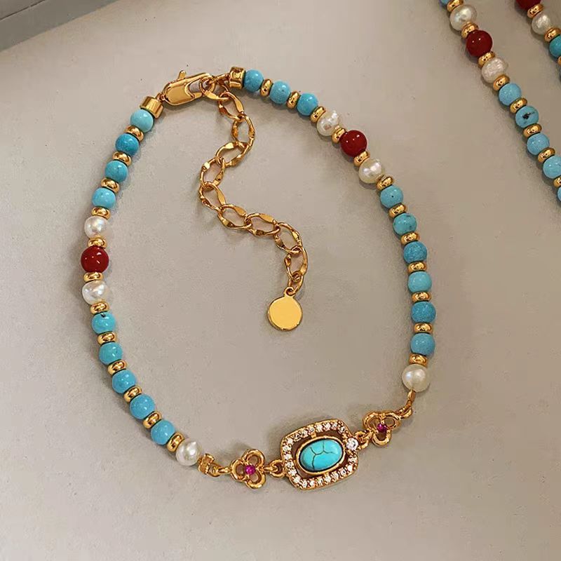 Natural turquoise pearl Chinese-style clavicle necklace featuring traditional design, elegant jewelry piece with vibrant turquoise and pearl accents.