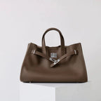 LadyShow.Store women's top layer cowhide all-match crossbody bag with adjustable strap and stylish design.