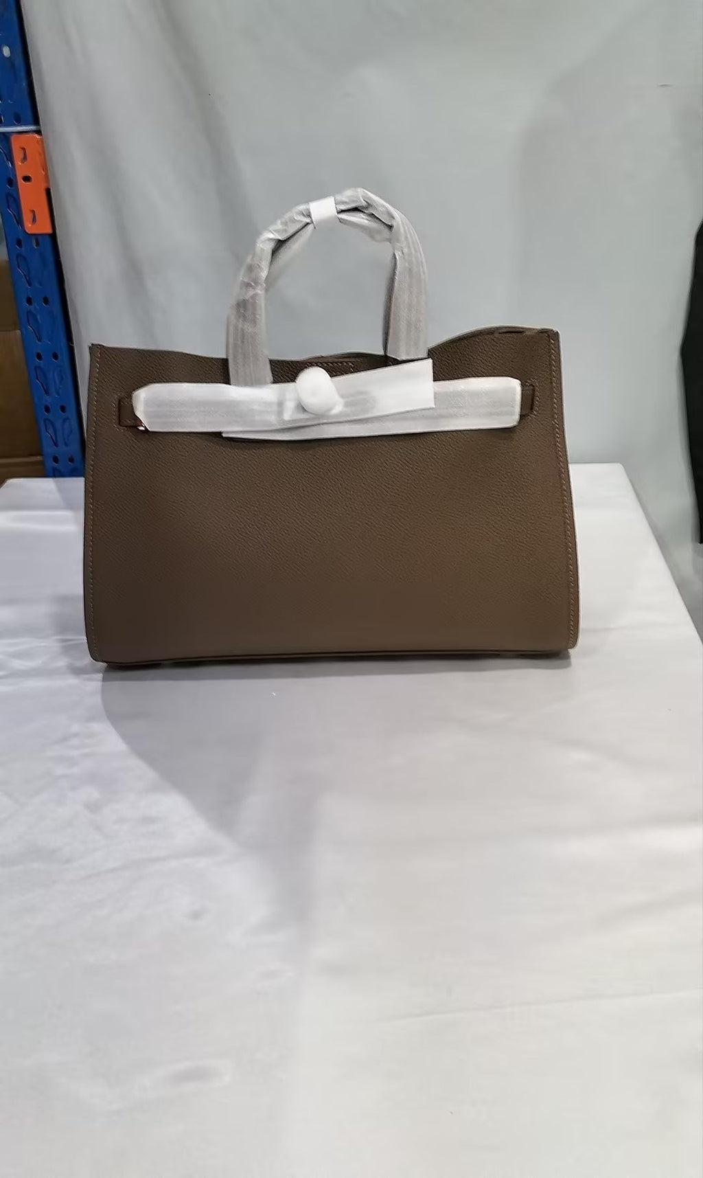 LadyShow Store women's crossbody bag made of top-layer cowhide, stylish all-match design, compact and versatile for daily use.
