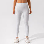 Nude Feel women's Pilates and yoga activewear set by FitiqueFit, featuring a seamless nude-colored sports bra and leggings.