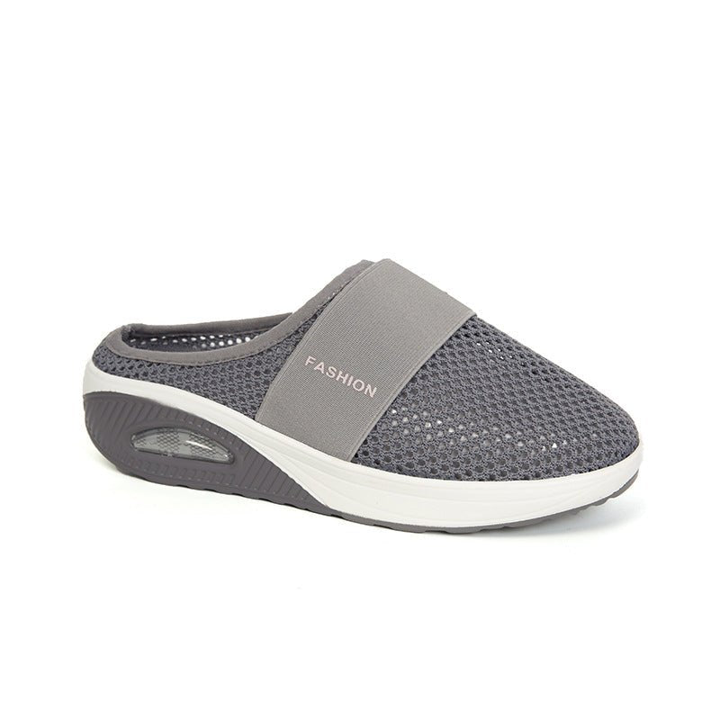 Comfortable plus-size female slippers with thick air-cushion soles and one pedal design, ideal for relaxing indoor wear.