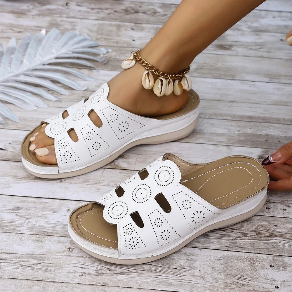 Women's open-toe cutout low heel sandals by Trendsi featuring stylish design and comfortable fit, perfect for casual or dressy occasions.