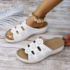 Women's open-toe cutout low heel sandals by Trendsi featuring stylish design and comfortable fit, perfect for casual or dressy occasions.