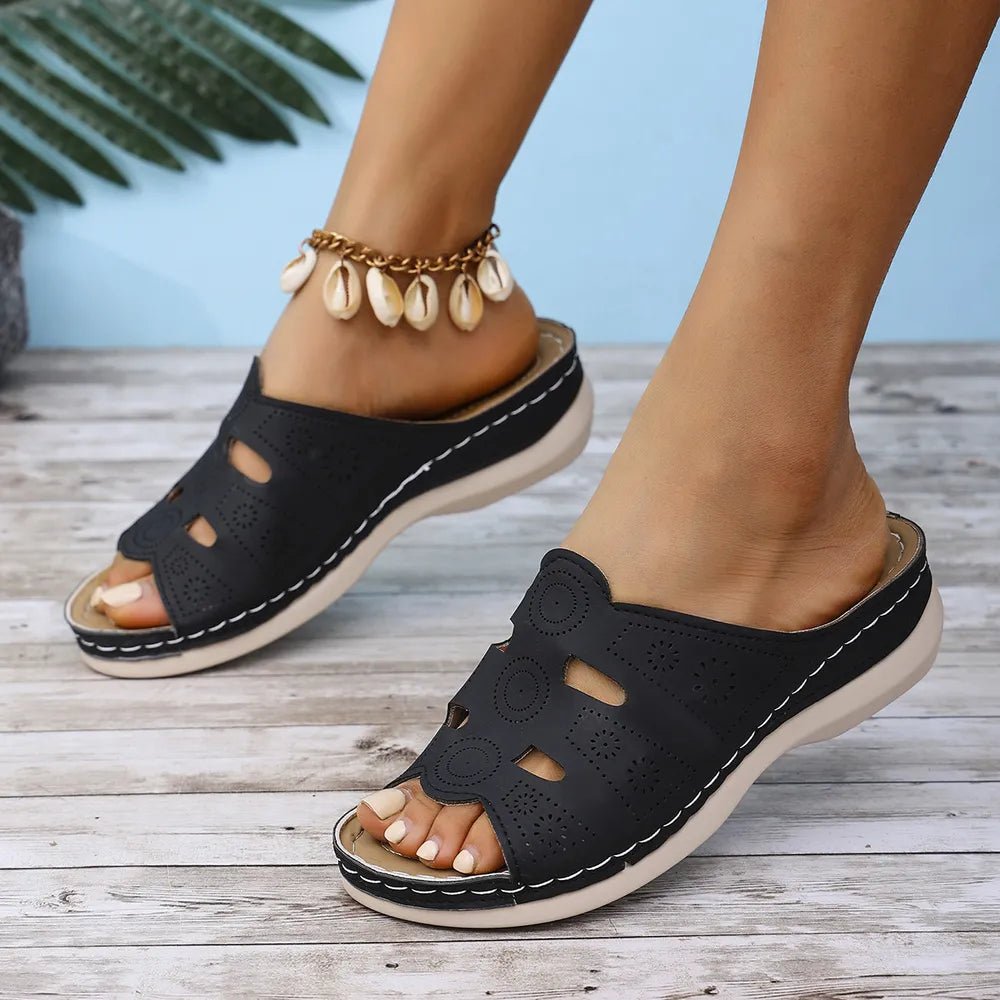 Women's open-toe cutout low heel sandals by Trendsi featuring a stylish design and comfortable fit.