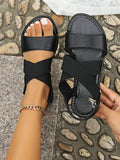 Women's breathable mesh open-toe flat sandals with lightweight casual design, featuring open toes and comfortable flat soles.