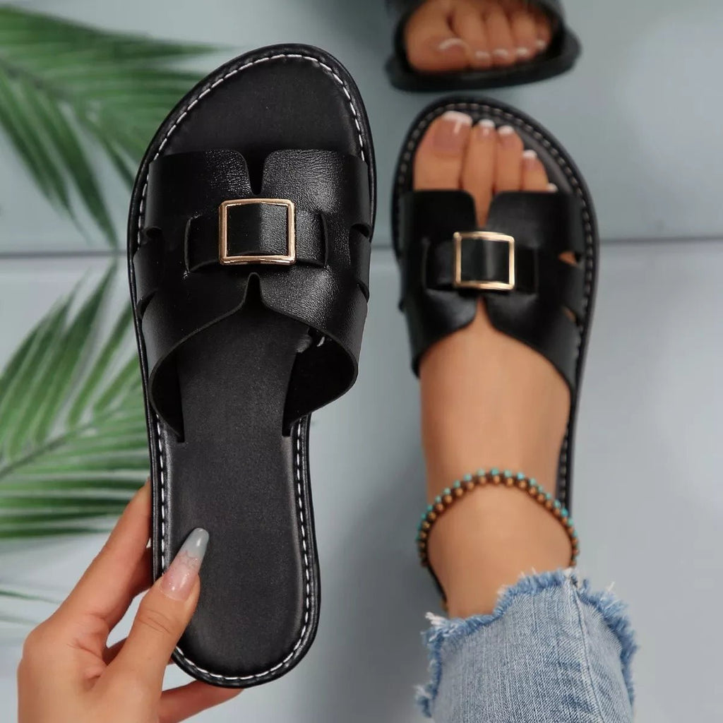 Women's open-toe flat sandals made of PU leather with comfortable design, perfect for casual summer wear.