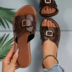 Women's open-toe flat sandals made of comfortable PU leather by Trendsi, featuring a stylish and breathable open-toe design.