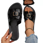 Women's comfortable PU leather open-toe flat sandals with a stylish design, perfect for casual or summer wear.