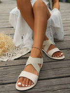 Women's breathable mesh open-toe flat sandals with lightweight casual design, featuring open toes and comfortable flat soles.