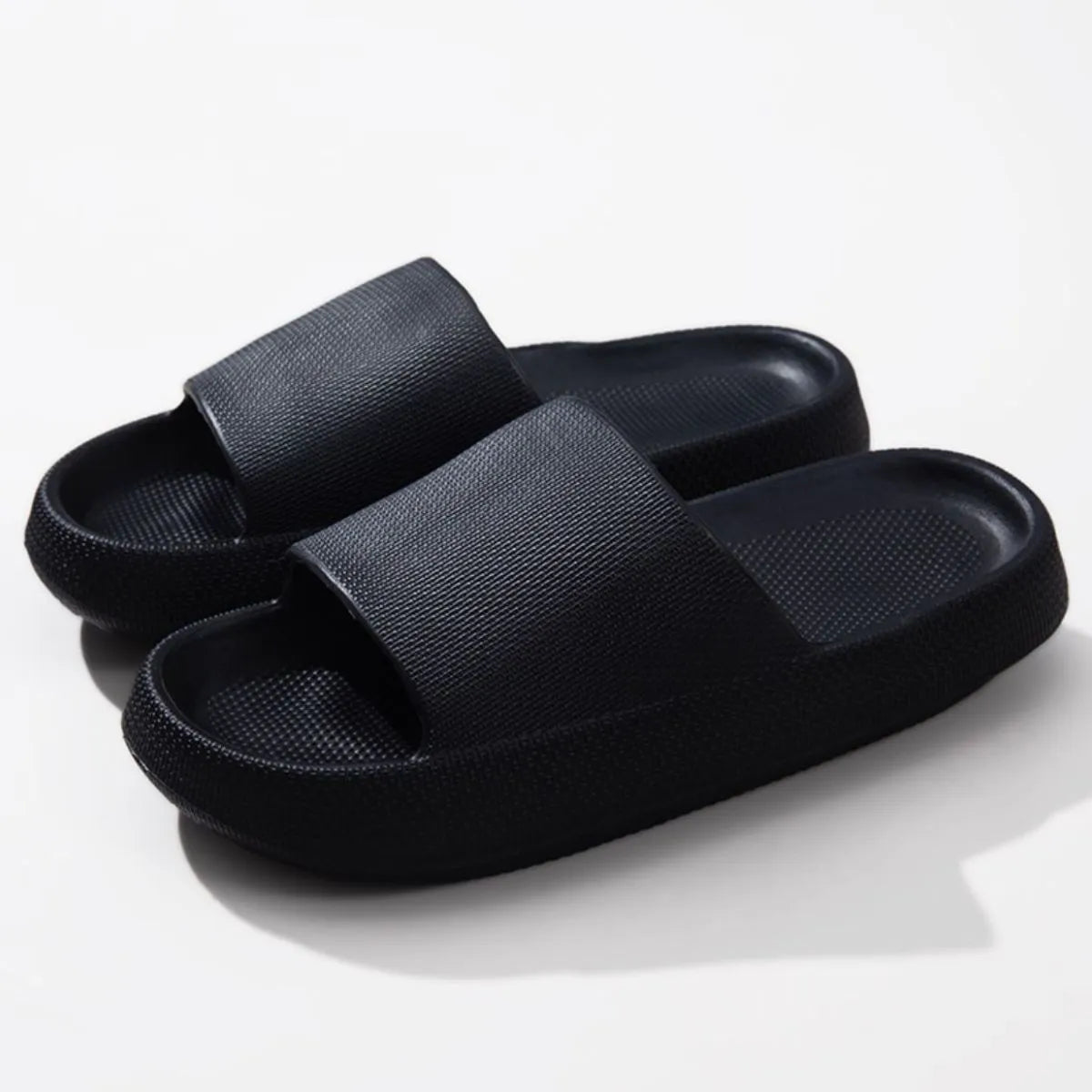 Women's lightweight EVA platform slides with open toe design and slip-on style, perfect for casual wear and comfort.