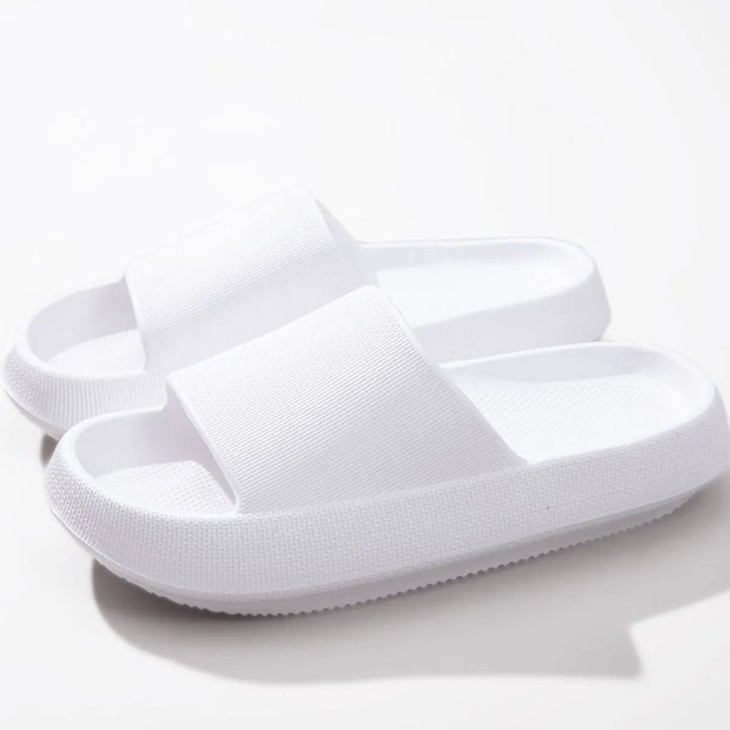 Women's lightweight EVA platform slides by Trendsi featuring open-toe slip-on sandals with a comfortable, stylish design.