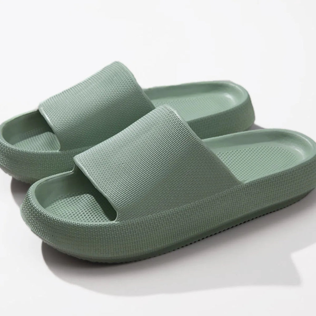 Women's lightweight EVA platform slides with open toe design and slip-on style, offering comfortable, casual footwear.