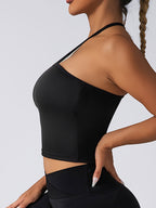 FitiqueFit padded crop top push-up sports bra, seamless supportive gym tank for women with padded cups and racerback design.