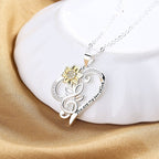 Pastoral-style two-color sunflower pendant necklace with heart-shaped chain, featuring a trendy design and layered look.