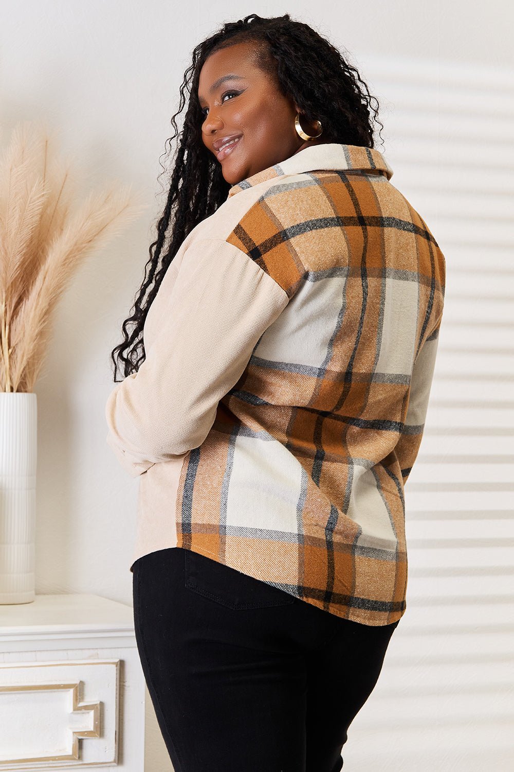 Women’s casual plaid long sleeve shirt with dropped shoulders by Plush Fashion Hub, featuring a relaxed fit and classic pattern.