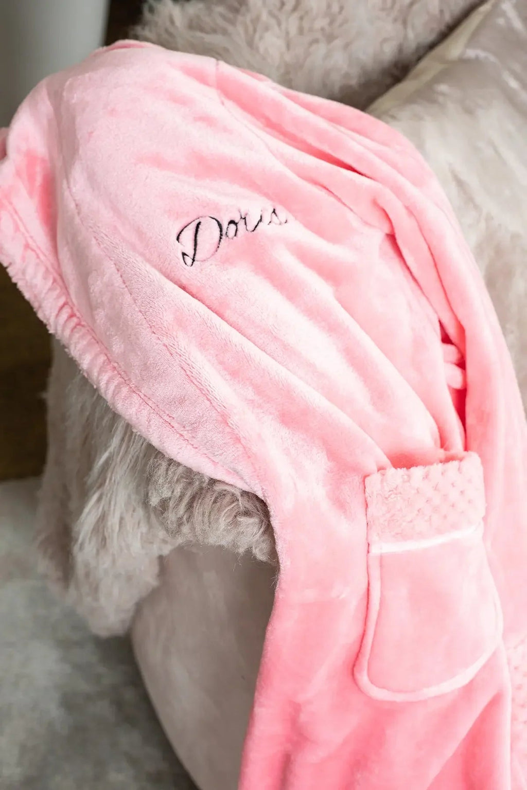 Women’s ultra-soft plush bathrobe by Lotus Linen, shown with relaxed fit, cozy collar, and tied waist in soft plush fabric.
