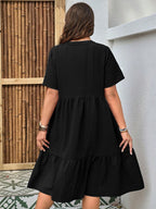 Plus-size button-front V-neck midi dress by FitiqueFit, casualwear, featuring a flattering V-neck and button details in relaxed style.