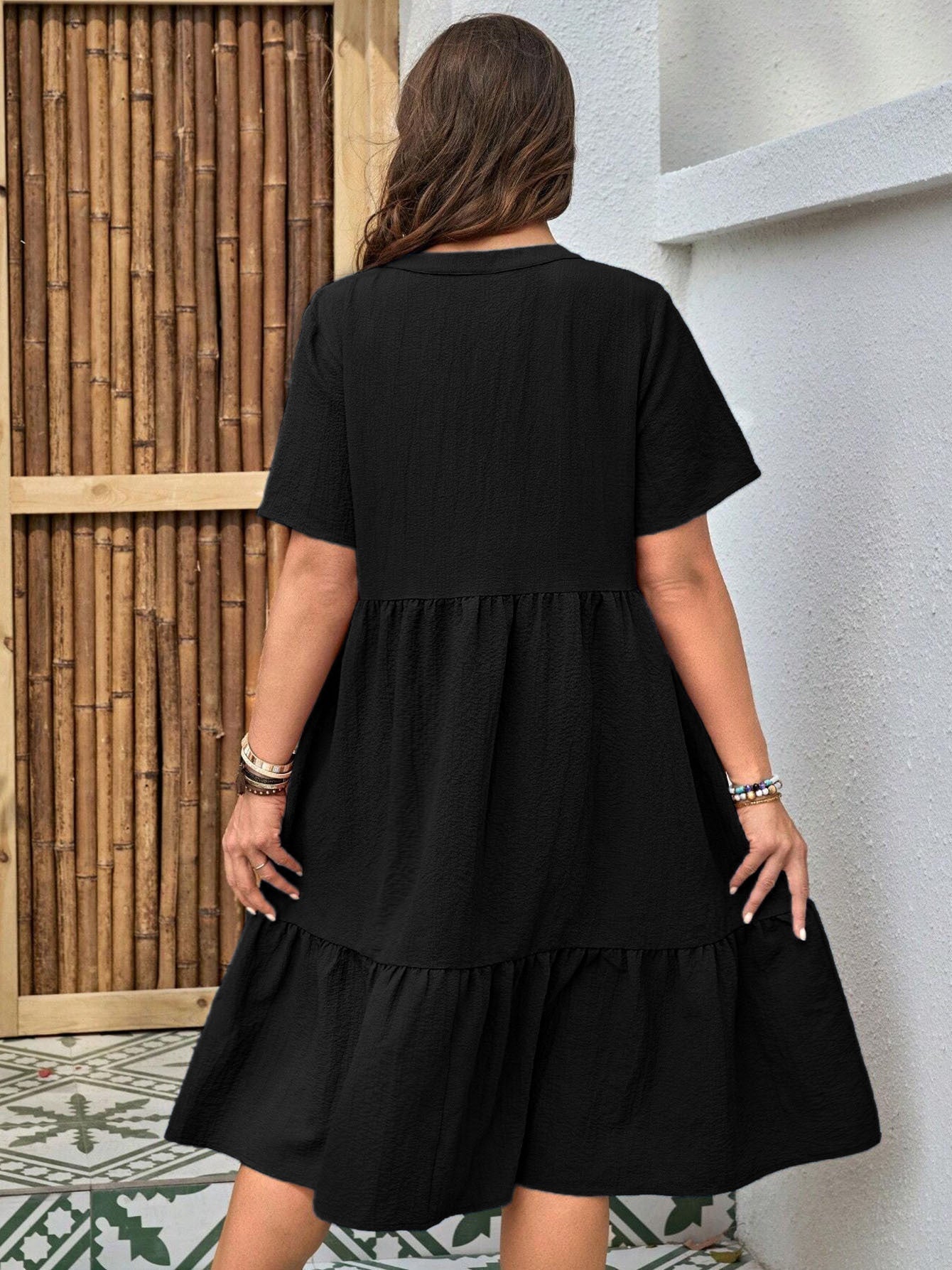 Plus-size button-front V-neck midi dress by FitiqueFit, casualwear, featuring a flattering V-neck and button details in relaxed style.