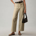 Plus size high-waisted slimming solid color suit pants by FitiqueFit, casualwear, front view showing tailored fit and comfortable waistband.