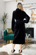 Soft plush women's bathrobe from Lotus Linen, showing cozy, ultra-soft fabric and relaxed fit for comfortable lounging.