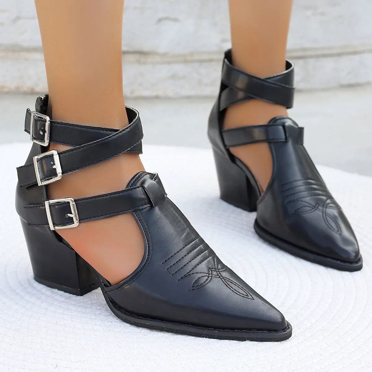 Women's pointed toe block heel sandals by Trendsi, featuring a stylish mid-heel design and comfortable dress shoe style.