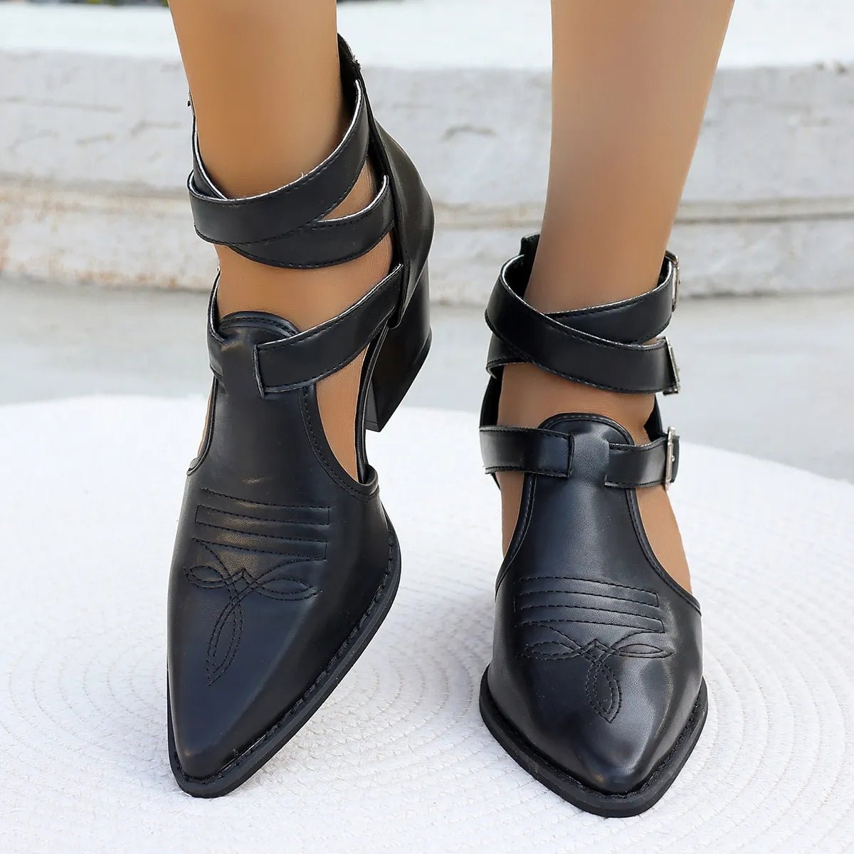 Women's pointed toe block heel sandals by Trendsi featuring a mid-heel design and open toe for stylish comfort.