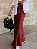 Elegant satin skirt by Bella Mia featuring lace-up design, long length, perfect for spring and autumn fashion.