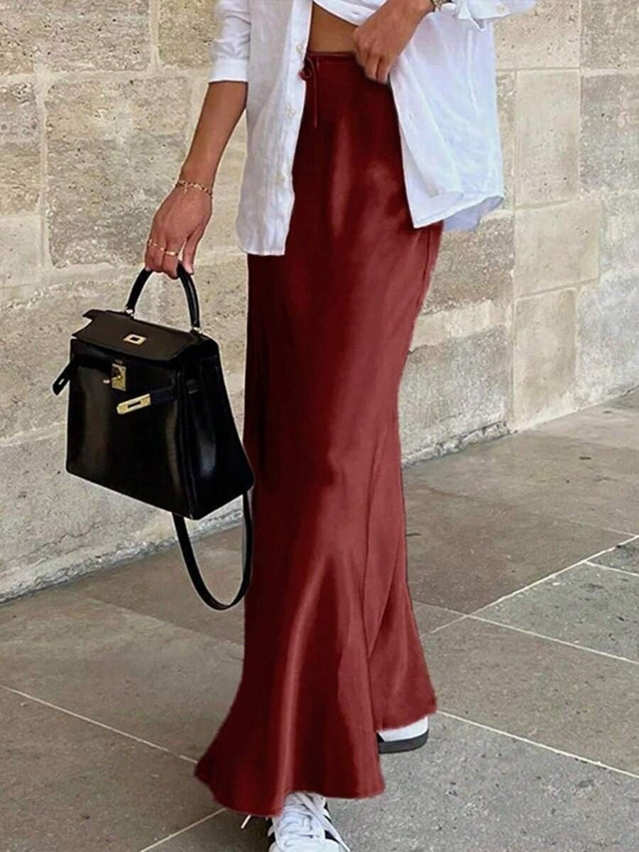 Elegant satin skirt by Bella Mia featuring lace-up design, long length, perfect for spring and autumn fashion.