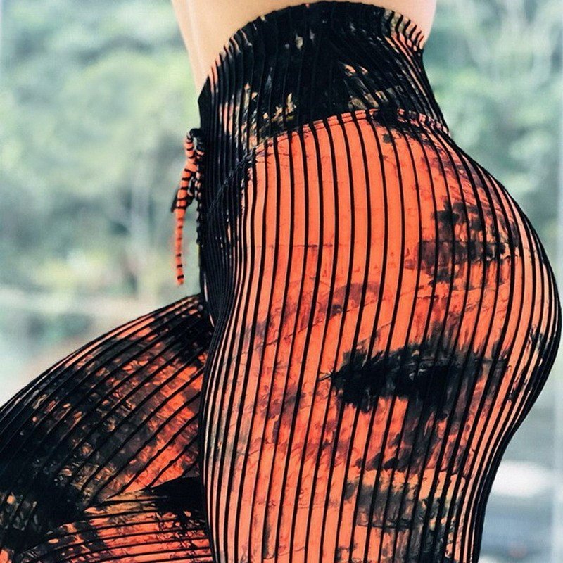 Printed high-waist stretchy leggings by FitiqueFit, stylish casualwear with bold print, designed for comfort and active wear.