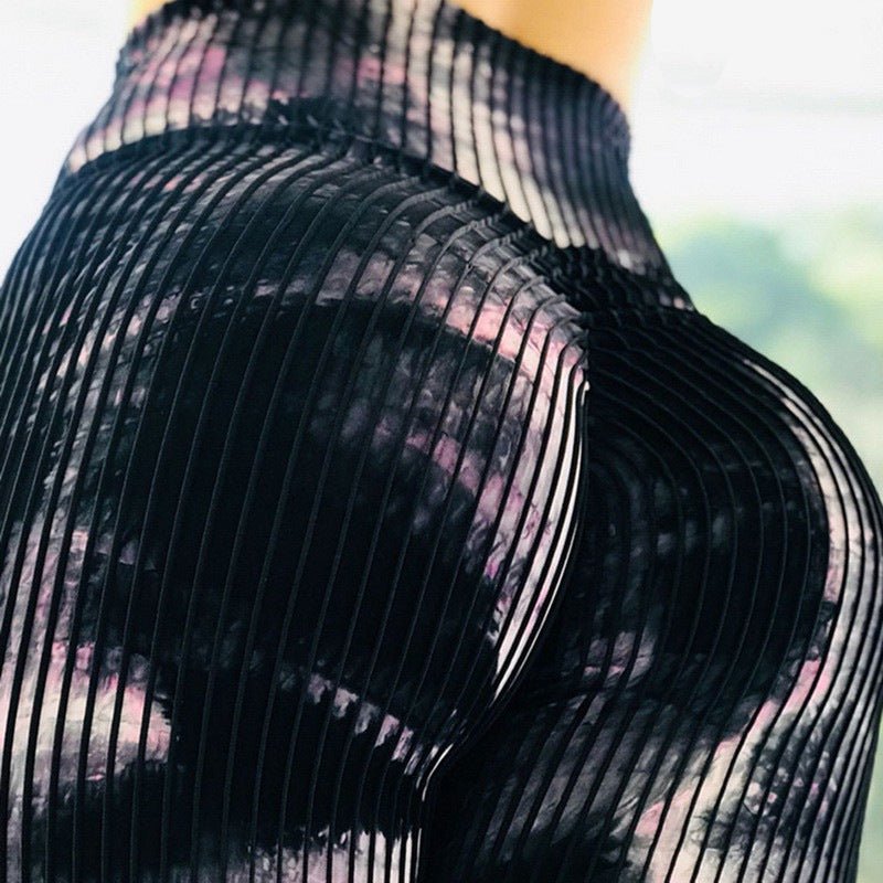 Printed high-waist stretchy leggings by FitiqueFit, stylish casualwear with bold patterns and comfortable fit for active wear.
