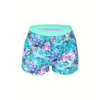Printed high-waist slimming bikini three-piece set by FitiqueFit, featuring a stylish top, bottoms, and cover-up in vibrant patterns.