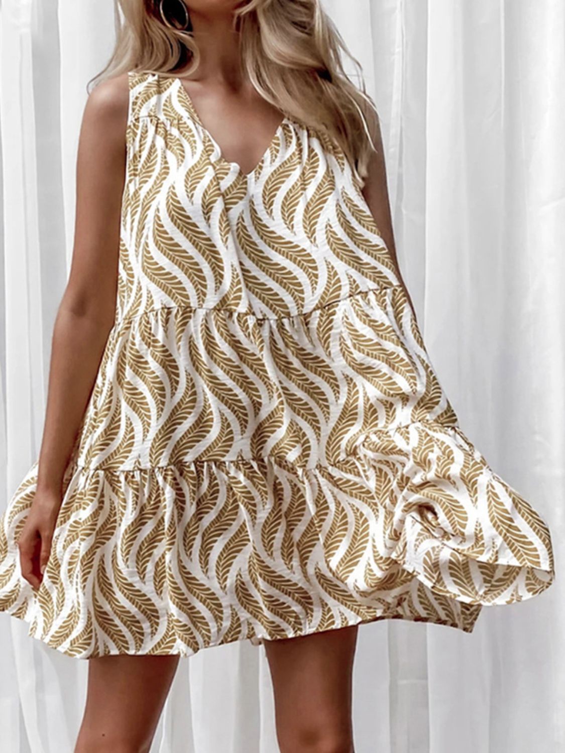 Printed V-neck sleeveless A-line mini dress for women by Plush Fashion Hub, showing the colorful floral pattern and summer style.