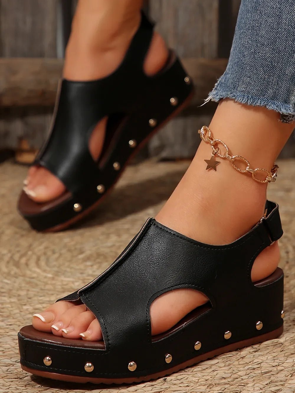 Women’s studded PU leather wedge sandals with comfortable casual design, featuring ankle straps and summer-ready style.