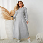 Plus size hooded A-line casual dress for women by Plush Fashion Hub, featuring a comfortable autumn-ready design.