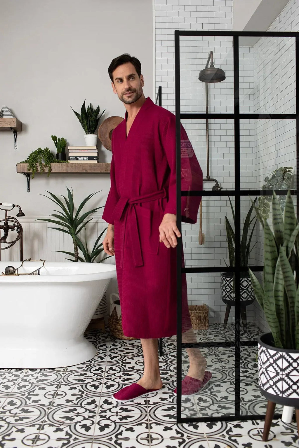 Red Lotus Linen waffle spa bathrobe for men, lightweight and absorbent, shown hanging on a hook.
