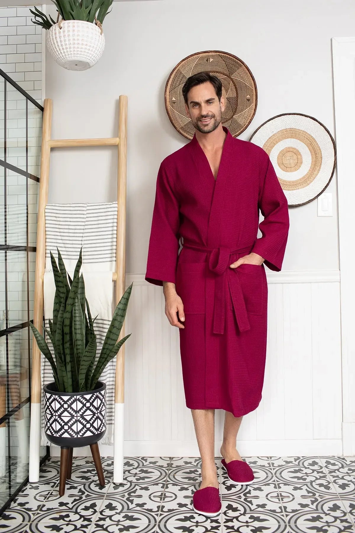 Red Lotus Linen men's waffle spa bathrobe hanging, lightweight and absorbent, ideal for comfortable post-bath relaxation.