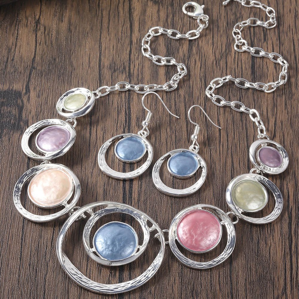 Retro oil-dropped hollow round earrings and women's necklace set, stylish jewelry by LadyShow.Store featuring vintage design.
