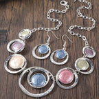 Retro oil-dropped hollow round earrings and matching women's necklace featuring elegant jewelry design by LadyShow.Store.