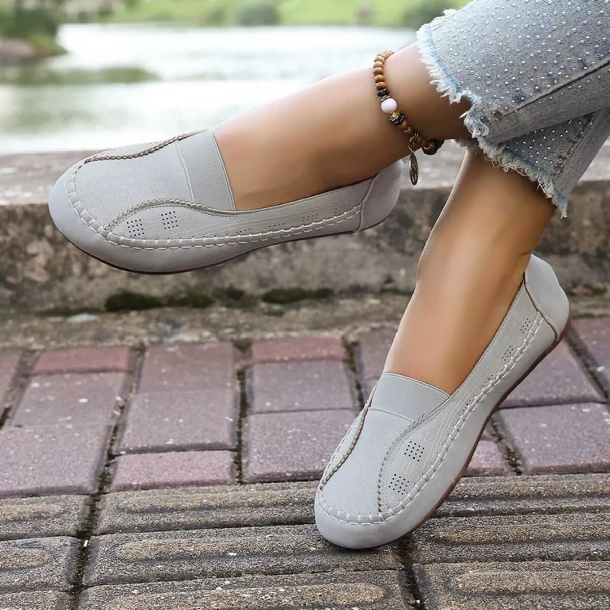 Women's breathable mesh slip-on flats with round toes from Plush Fashion Hub, designed for comfortable walking.