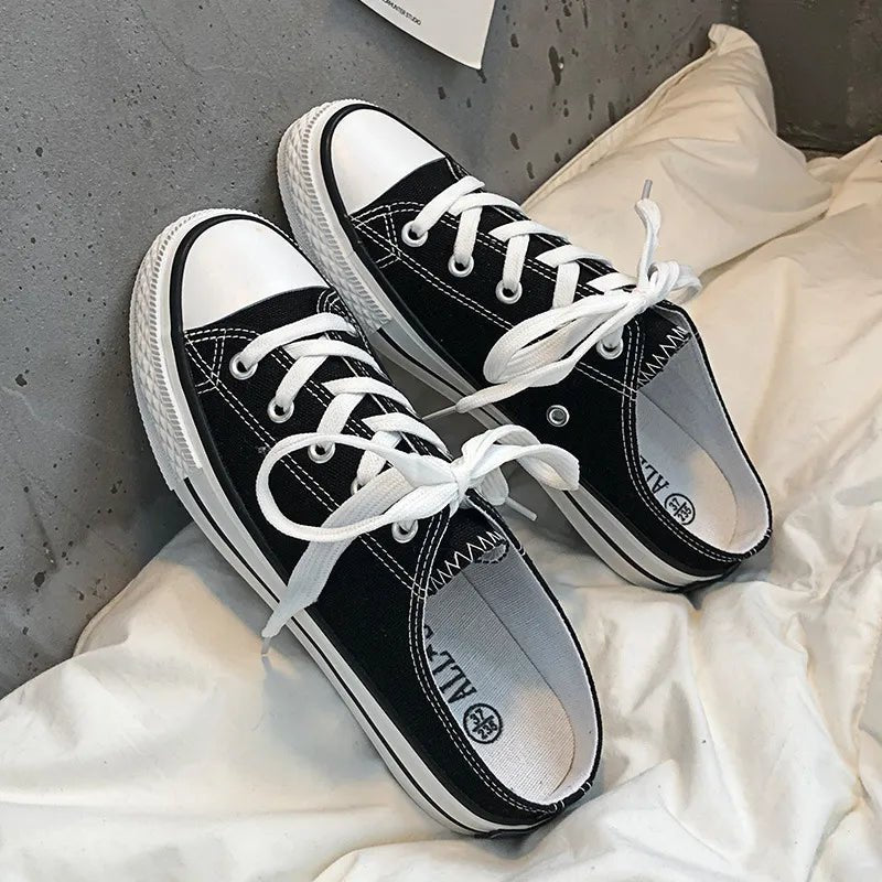 Lightweight women's round toe lace-up canvas sneakers by Plush Fashion Hub, casual flat shoes with a classic design.