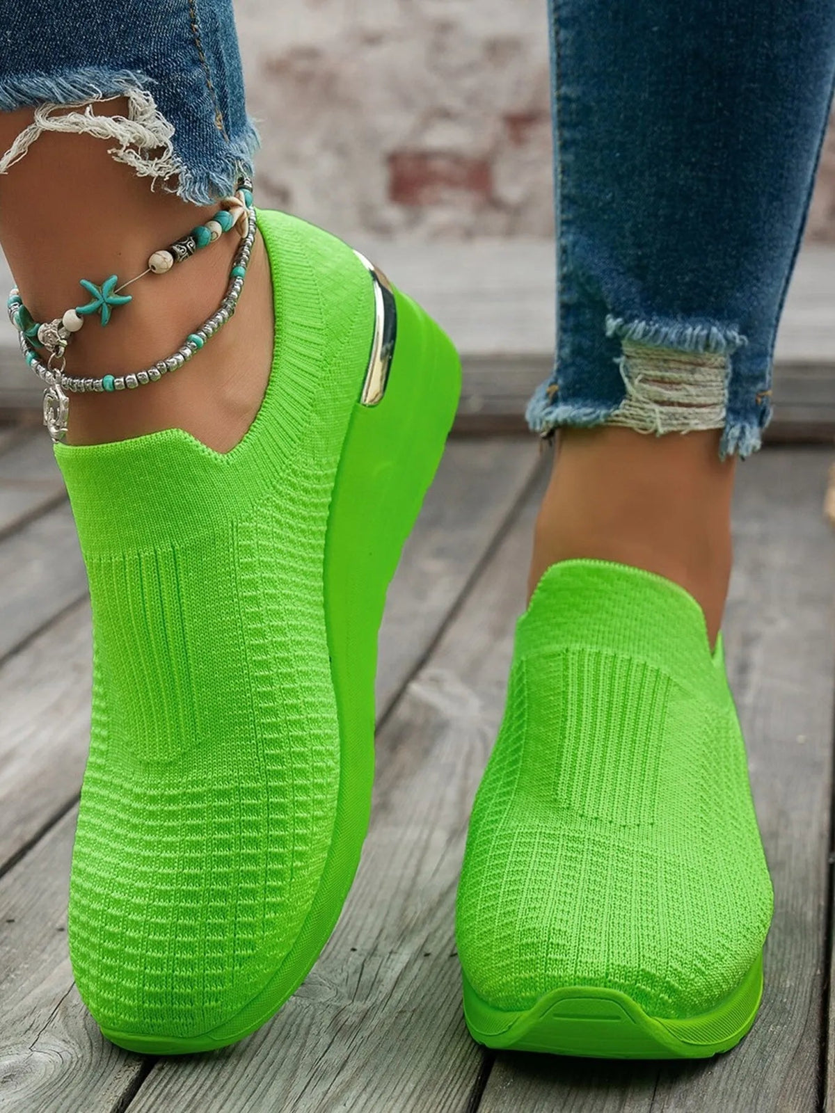 Women's round toe wedge sneakers by Plush Fashion Hub, featuring breathable material and stylish comfort in a fashionable shoe design.