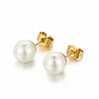 Sterling silver freshwater pearl ear studs featuring delicate needle design, perfect for elegant everyday wear.