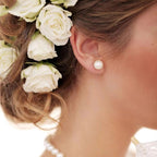 S925 sterling silver freshwater pearl stud earrings with needle design, elegant and natural for everyday wear.